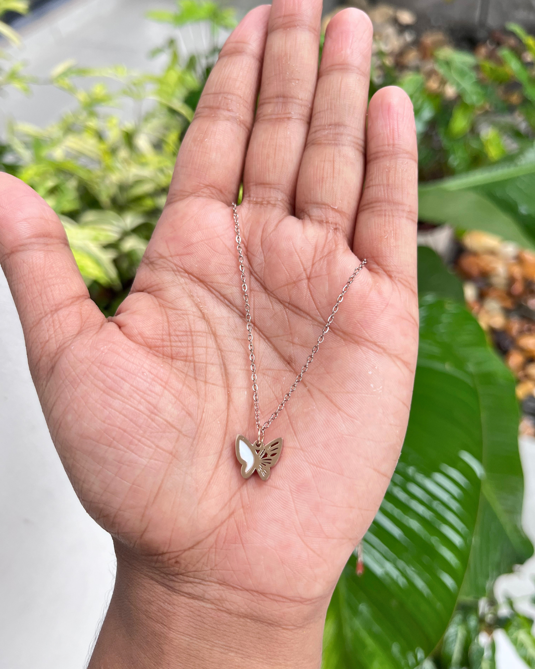 Trendy Butterfly Charm Neckchain two sided (Black & White)